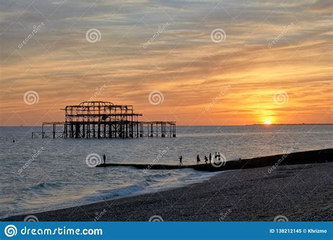 The Ruins of Brighton`s West Pier Silhouetted Against a Setting Sun ...