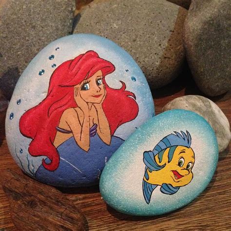 Disney's The Little Mermaid on painted rocks #rockpainting #stonepainting #rockart #mermaid # ...