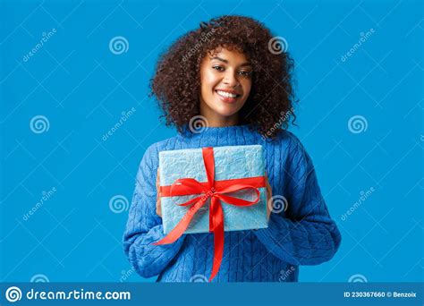 Holidays, Winter Season and Christmas Concept. Lovely Cute African-american Woman Wrapped Her ...