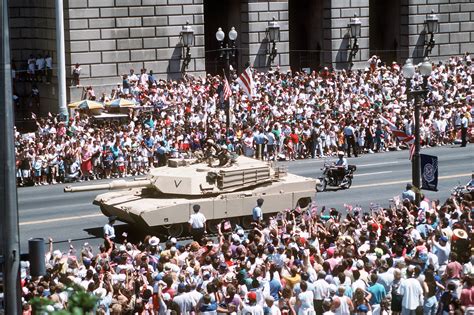 U.S. Army soldiers drive an M-1A1 Abrams tank in the National Victory Celebration parade in ...