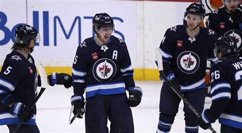 Jets score three goals in third period to complete comeback win over Ducks