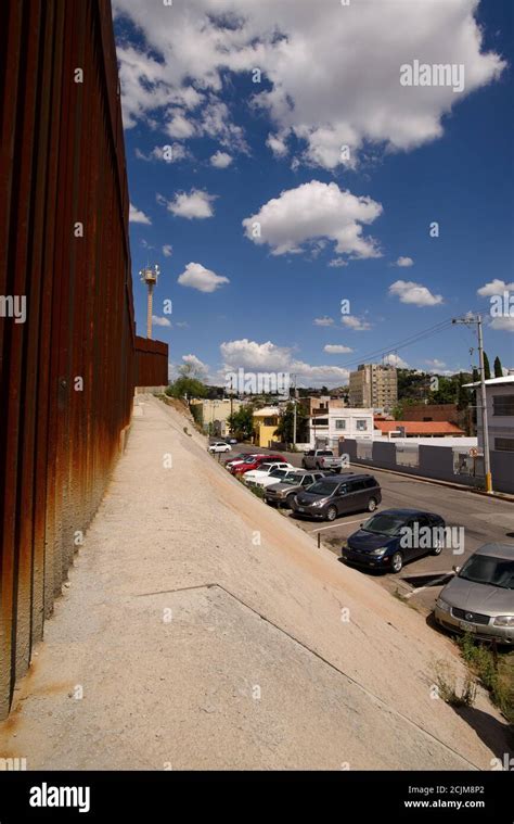 The border wall with Nogales, Arizona, USA, in Nogales, Sonora, Mexico ...