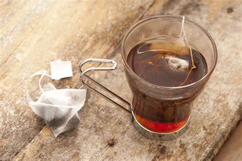 Cup of steeping black tea - Free Stock Image