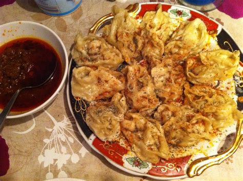 "Mantu " Afghan dish puff pastry filled with minced onion, yellow beans ...