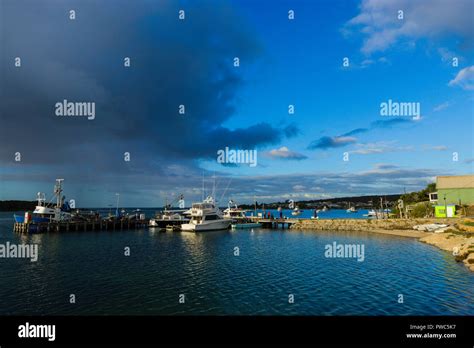 Fishing boats and pleasure craft moored at Coffin Bay wharf Coffin Bay ...