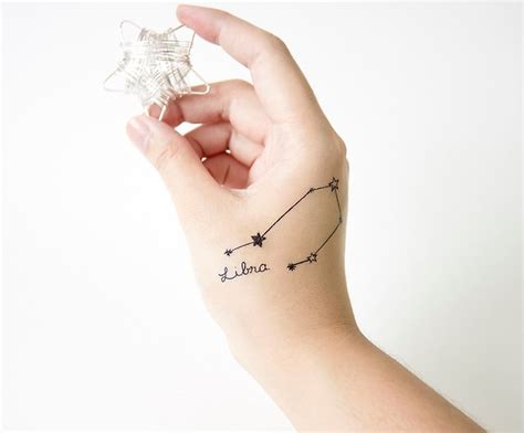 Unleash the Power and Beauty of Scorpio Constellation Tattoo with Flowers - Check out Our ...