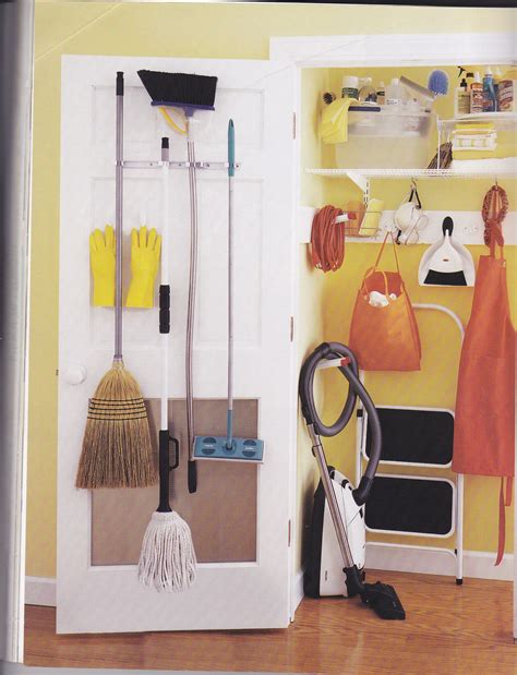 broom closet. Uses back of door. Vacuum hose hangs up with 3M hook ...