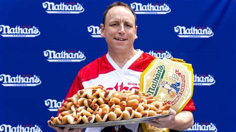 Hot dog eating champion devours over 60 hot dogs in 10 minutes | Sky News Australia