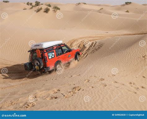 4X4 Vehicle Drives Around the Sand Dunes of the Sahara Desert ...