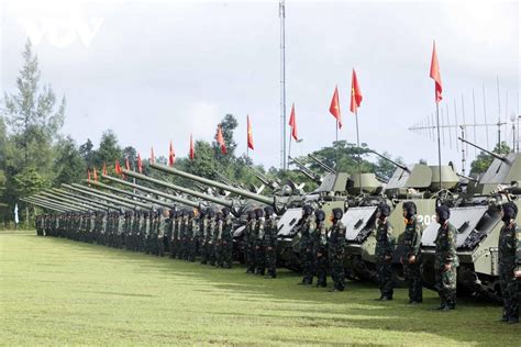 Soviet era T-54 main battle tanks (MBT) and former ARVN M113 armored personnel carriers (APCs ...