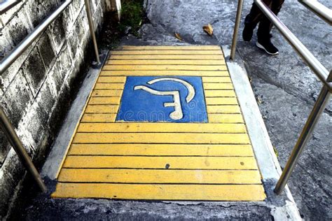 PWD or Person with Disability Ramp on a Sidewalk Stock Photo - Image of ...