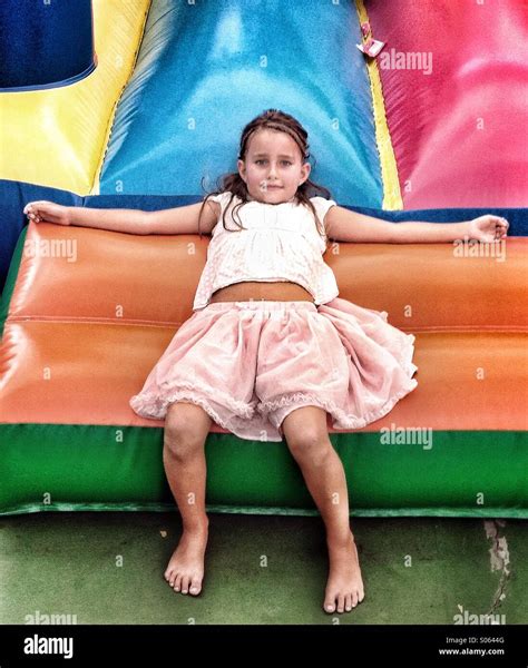 Girl on bouncy castle Stock Photo, Royalty Free Image: 309921600 - Alamy