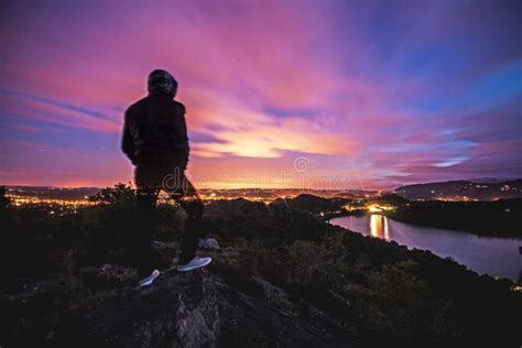 Man On Cliff At Sunset Picture. Image: 83062846