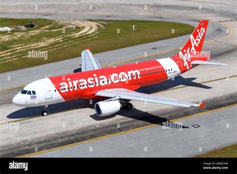 AirAsia Airbus A320 plane taxiing. Airplane of airline Thai AirAsia also know as AirAsia ...