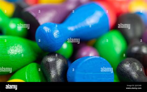 Lots of colorful game pieces for board games Stock Photo - Alamy