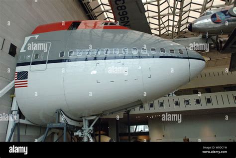 Work continues on a Boeing 747 fuselage display at the Smithsonian Air ...