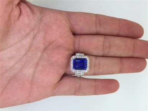 Exceptional Emerald Cut Tanzanite & Diamond Ring