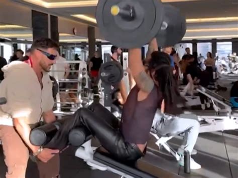 Lenny Kravitz completes his workout in leather pants