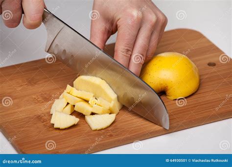 Cutting The Fruit Knife On A Chopping Board Stock Image - Image of ...