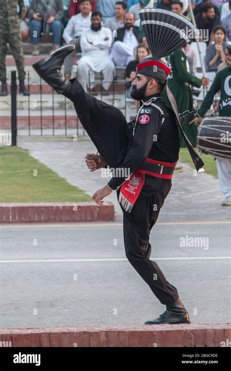 Wagah Border Ceremony on the border between Pakistan and India. Soldiers from both countries ...