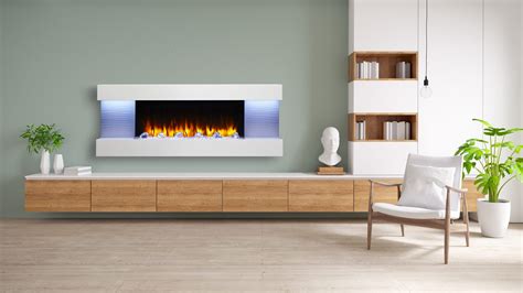 The SimpliFire Format wall-mount electric fireplace utilizes a floating mantel that creates a ...