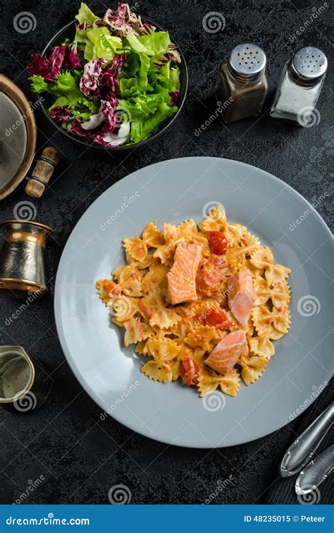 Farfalle with Tomato Sauce and Roasted Salmon Stock Image - Image of breast, gourmet: 48235015