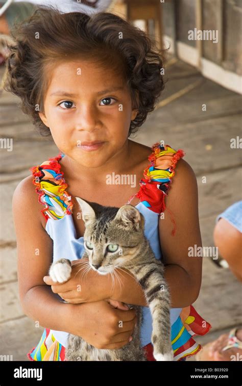 Peru Amazon River Indigenous Indian girl in the village of Islandia ...