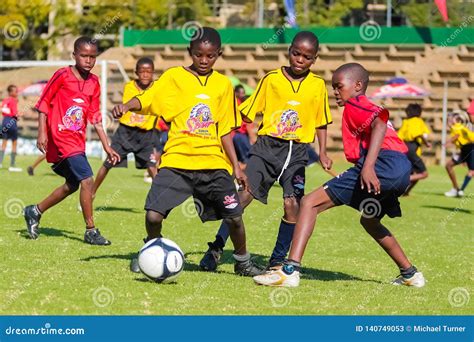 Diverse Children Playing Soccer Football at School Editorial Stock ...