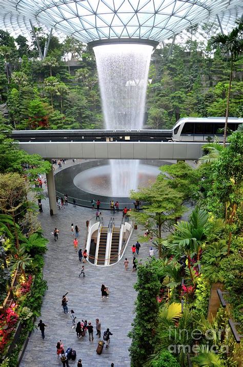 The Jewel waterfall monorail gardens and visitors Changi Airport Singapore Photograph by Imran ...