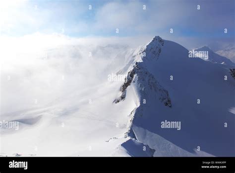 top of alps in sky Stock Photo - Alamy