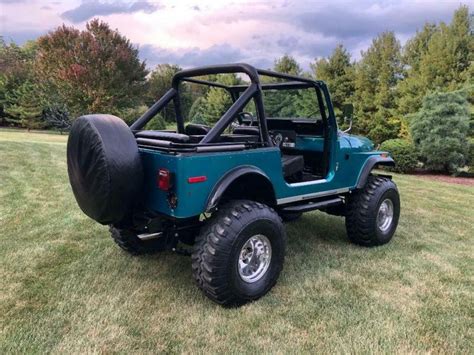 Cars - 1977 Jeep CJ7 Lifted Convertible Manual 304 V8