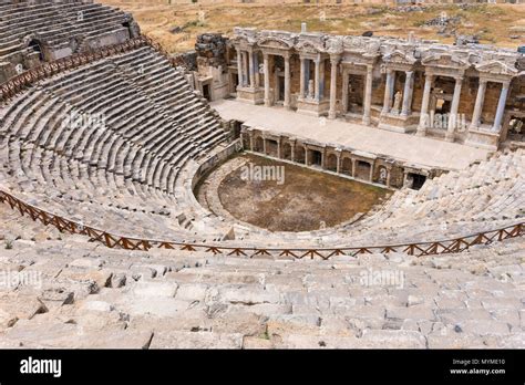 The ancient stone theatre and Greek amphitheatre in Hierapolis near ...