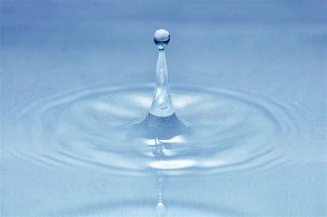 Droplet Splash on Water Surface Stock Photo - Image of macro, surface ...