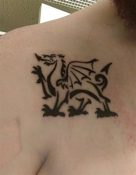 Got a Welsh dragon as a first tattoo. Lucas Varner, Gaia Tattoo, sharonville, OH : r/tattoos