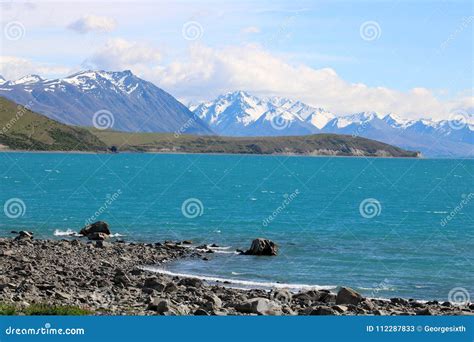 Lake Tekapo To Mountains with Snow on Peaks NZ Stock Image - Image of spring, sunny: 112287833