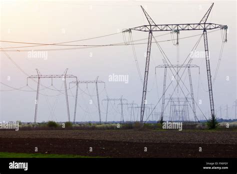 Electrical transmission towers in perspective Stock Photo - Alamy