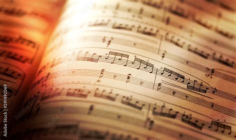 Sheets with music notes close-up on sunlight Stock Photo | Adobe Stock