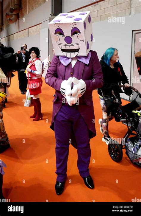 A cosplayer dressed as King Dice from the video games Cuphead during the MCM Comic Con held at ...