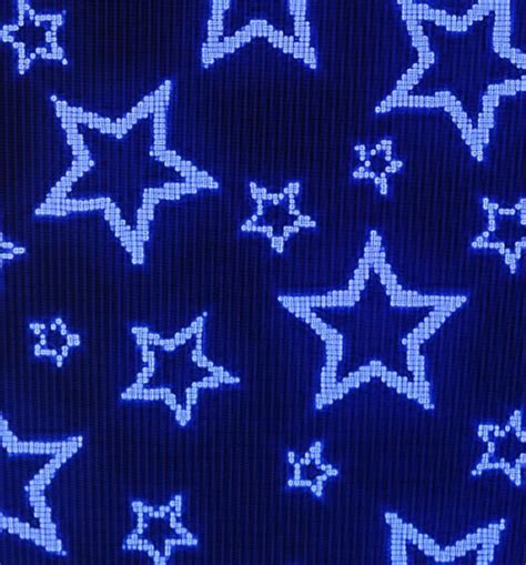 blue and white stars on a black background