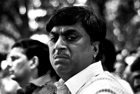 On the job. BJP supporter at an Anti-Suresh 'Calamity' Ka… | Flickr