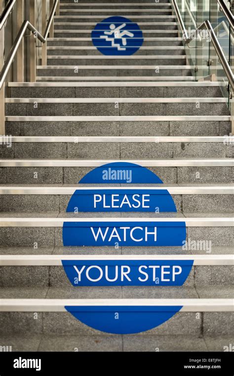 Please Watch Your Step ' Health And Safety ' Stairs Stock Photo - Alamy