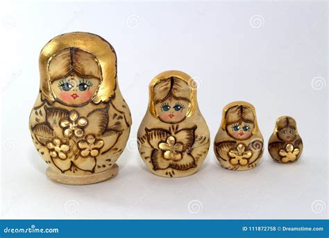 Four Wooden Nested Dolls on a White Background Close-up Stock Photo ...