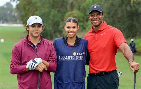 Tiger Woods' daughter Sam serves as his caddie for 1st time - ABC News