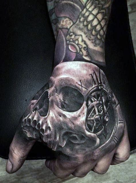 Men's Hand Skull Tattoos Designs | Skull hand tattoo, Hand tattoos for guys, Skull tattoo design