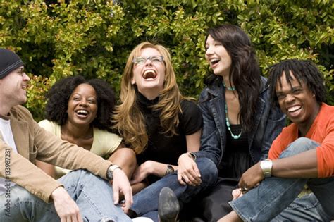 "Diverse group of people talking and laughing." Stock photo and royalty ...