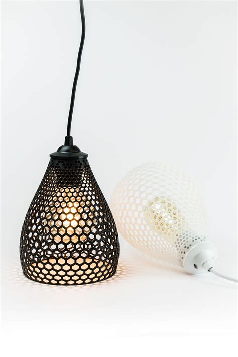 Variations of 3d printed lamps. Concept emerges from having a simple hexagonal grid and a basic ...