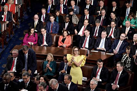 Sen. Kyrsten Sinema's yellow dress at State of the Union draws mockery ...