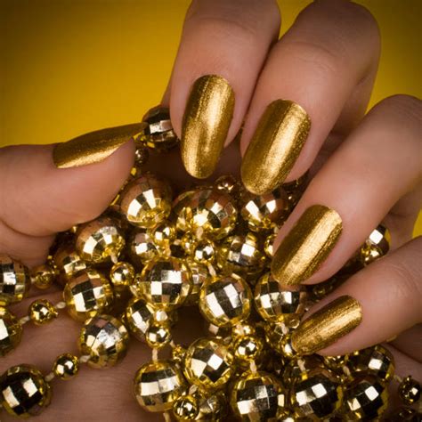 Gold Nail Polish Stock Photos, Pictures & Royalty-Free Images - iStock