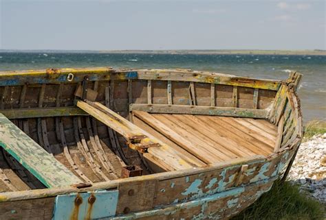 Premium Photo | Old rusty dry fishermans boat