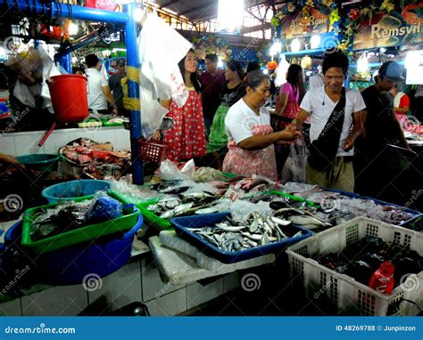 Meat and Fish Vendor in a Wet Market in Cubao , Quezon City, Philippines Editorial Stock Photo ...